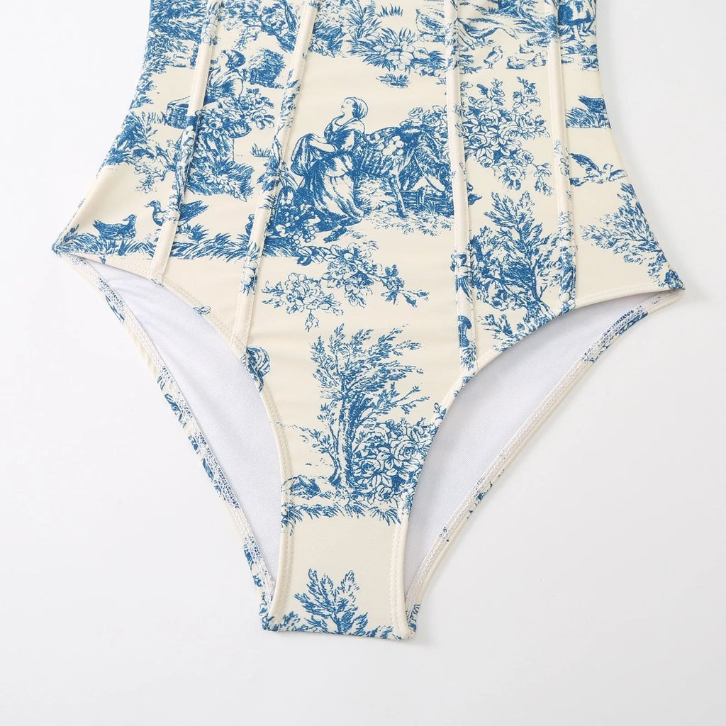 Blue women's one-piece swimsuit with detachable gauze skirt on size chart