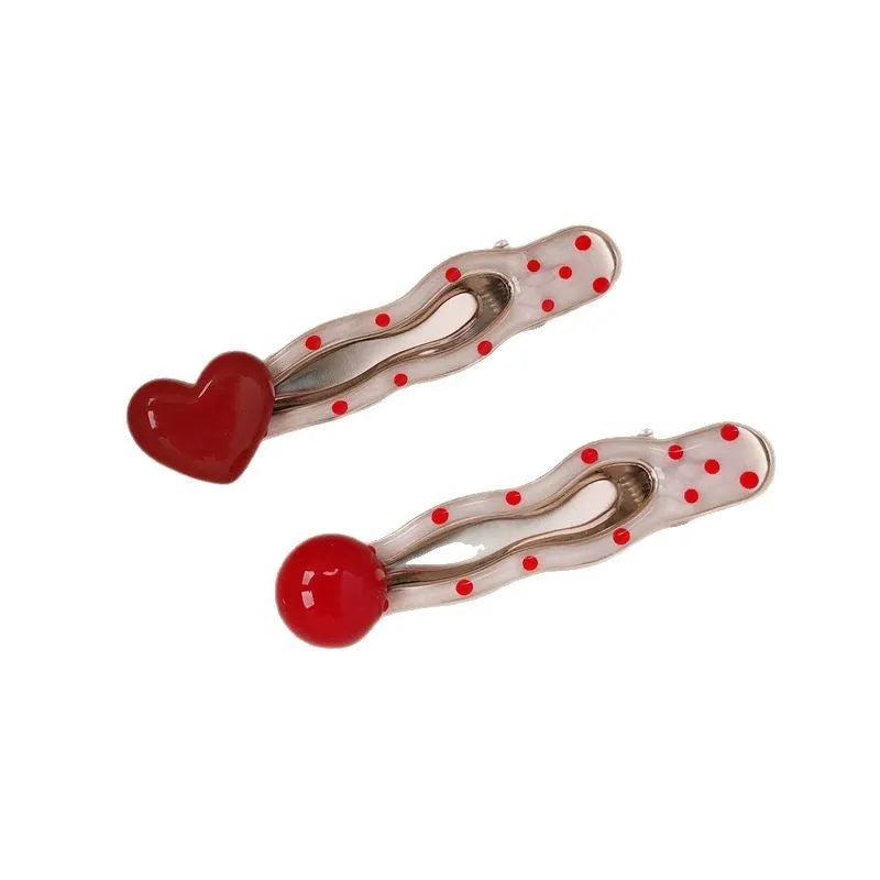 Red love heart-shaped hair barrette with 3D design, retro dots, and willow leaf decoration.