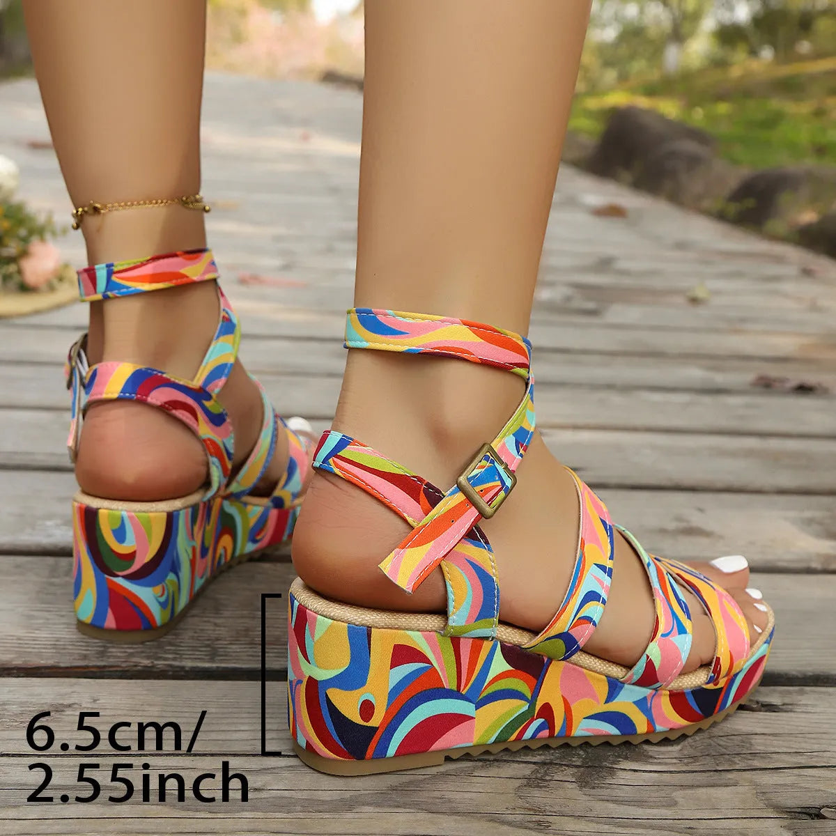 Women's lightweight buckle wedge sandals with fish mouth toe holder in a selected colour.