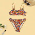 Plus size women's floral print bikini set with strapped design and brief style