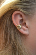 Gold electroplated alloy earrings with starfish and conch designs for women.