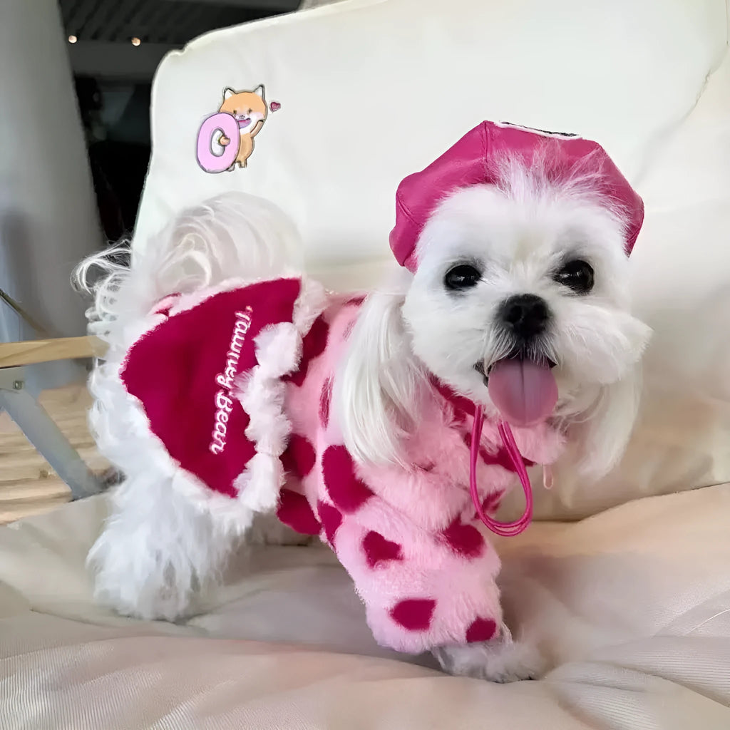 A pink plush polyester warm coat for a small dog, shown on a mannequin, British-style design.