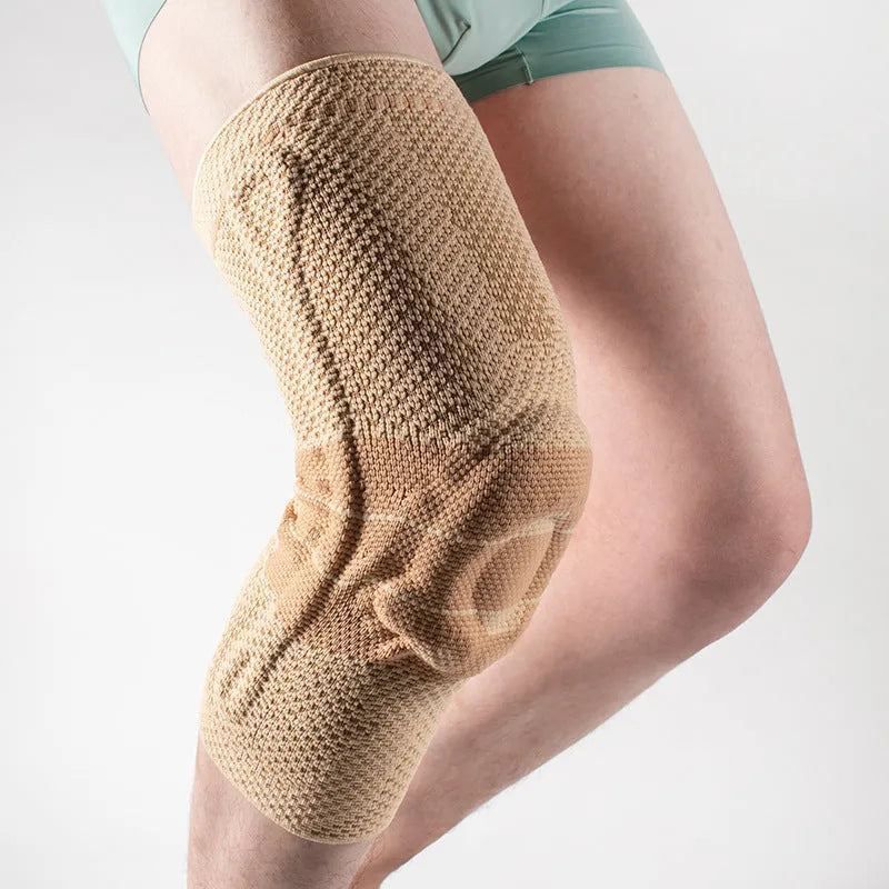 Adult sports knee pad in black and blue colour made from nylon and spandex material