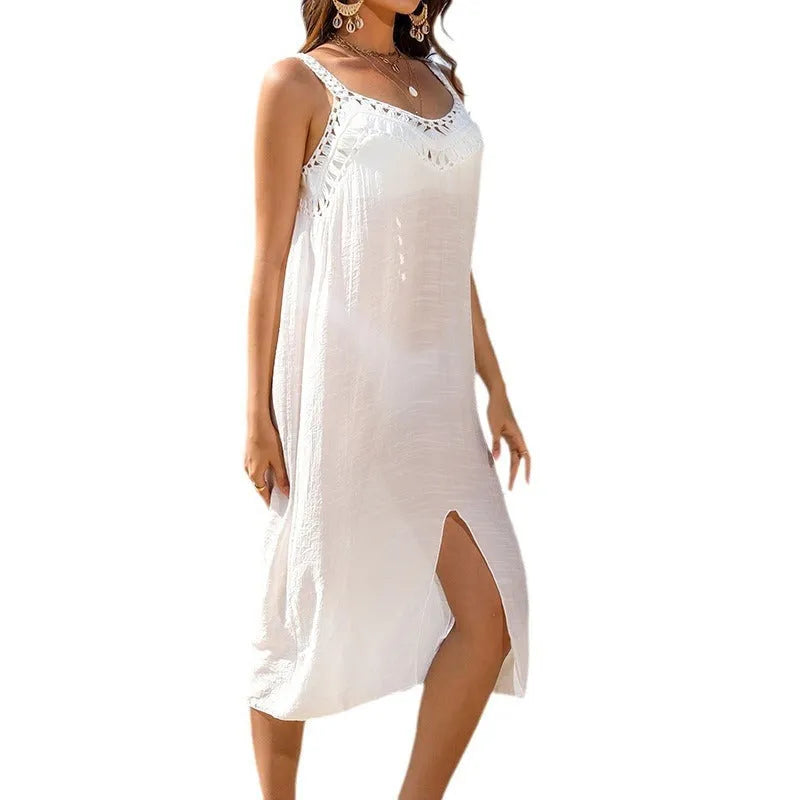White women's suspender beach dress with crochet weaving and V-neck design on mannequin