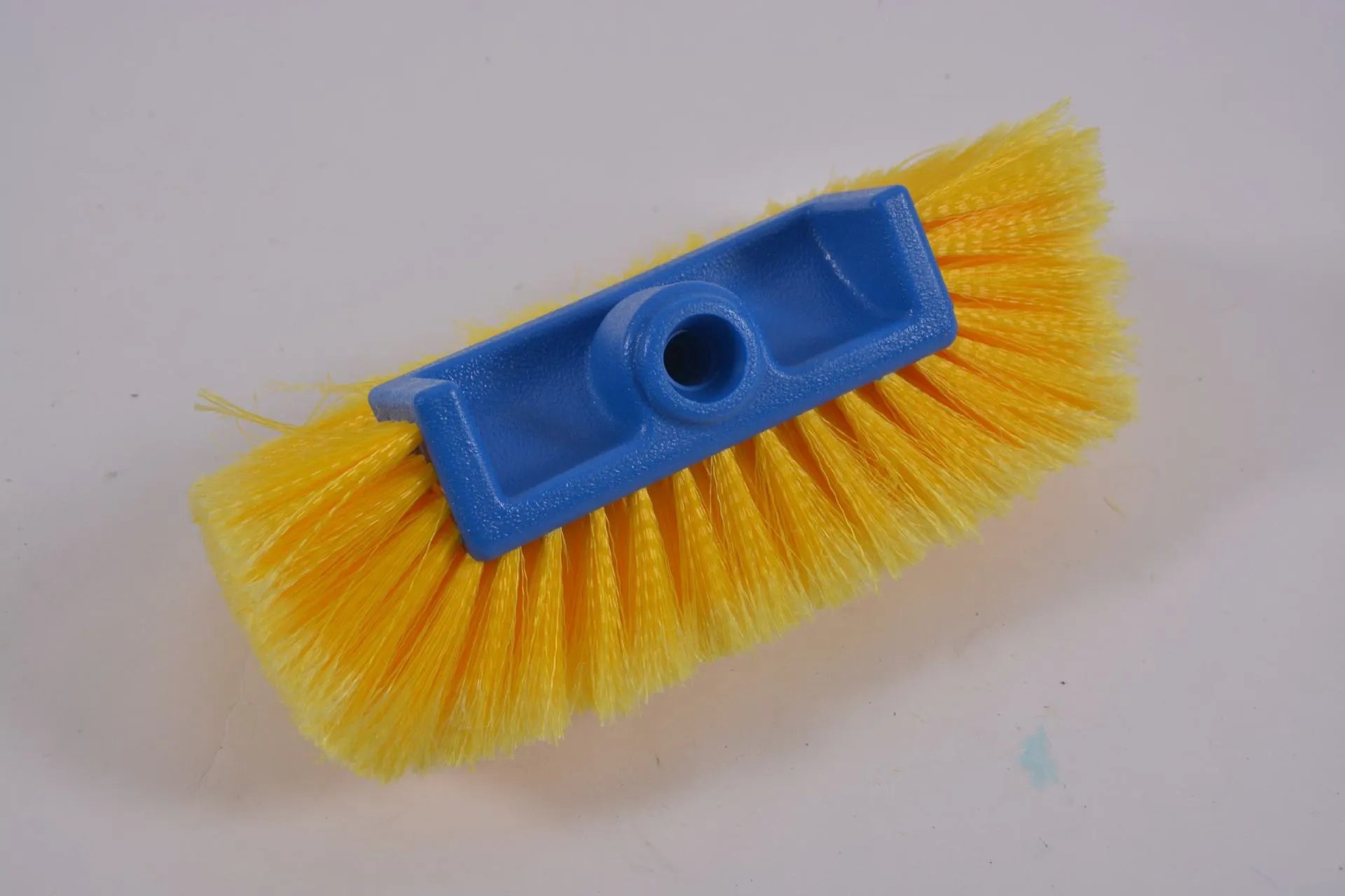 Yellow portable car wash brush with removable flow-through head and four-section adjustable rod