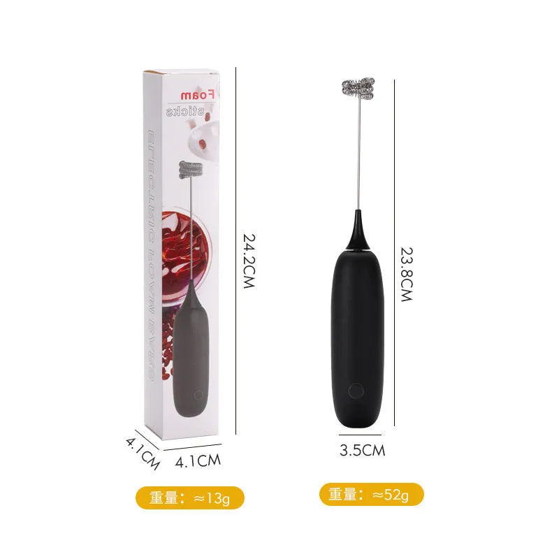 Black and white handheld electric milk frother blender for coffee preparation