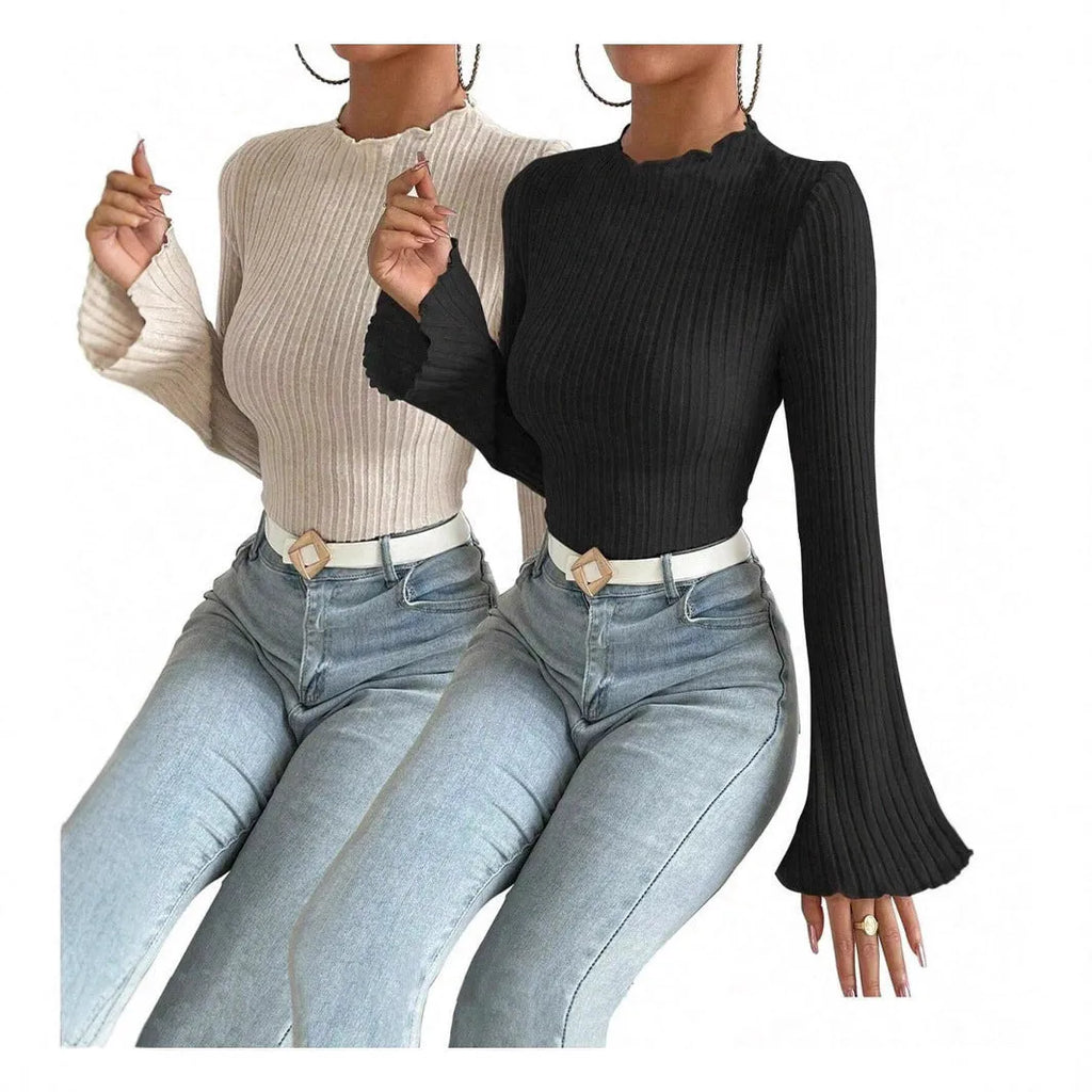 A man's black long sleeve top with a round neck and relaxed lantern sleeves in a slim fit.