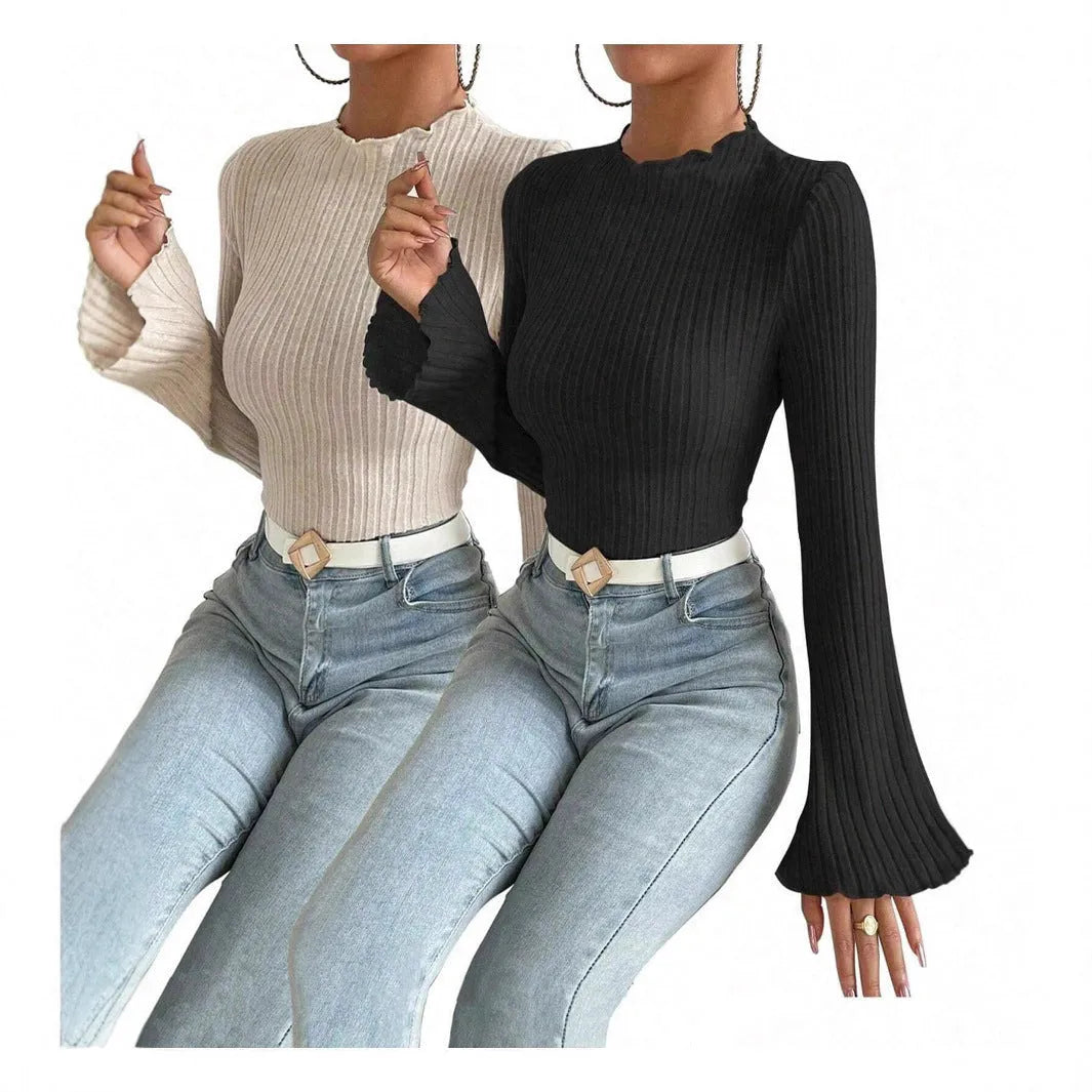 A man's black long sleeve top with a round neck and relaxed lantern sleeves in a slim fit.