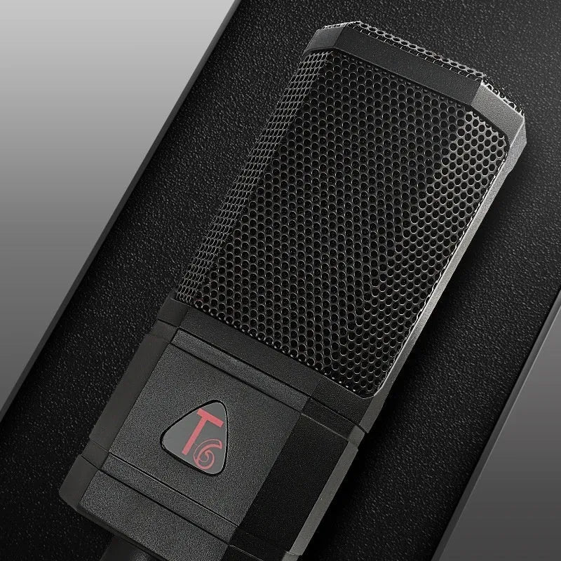 Black condenser wired noise cancelling microphone with shockproof mounting for recording and live streaming