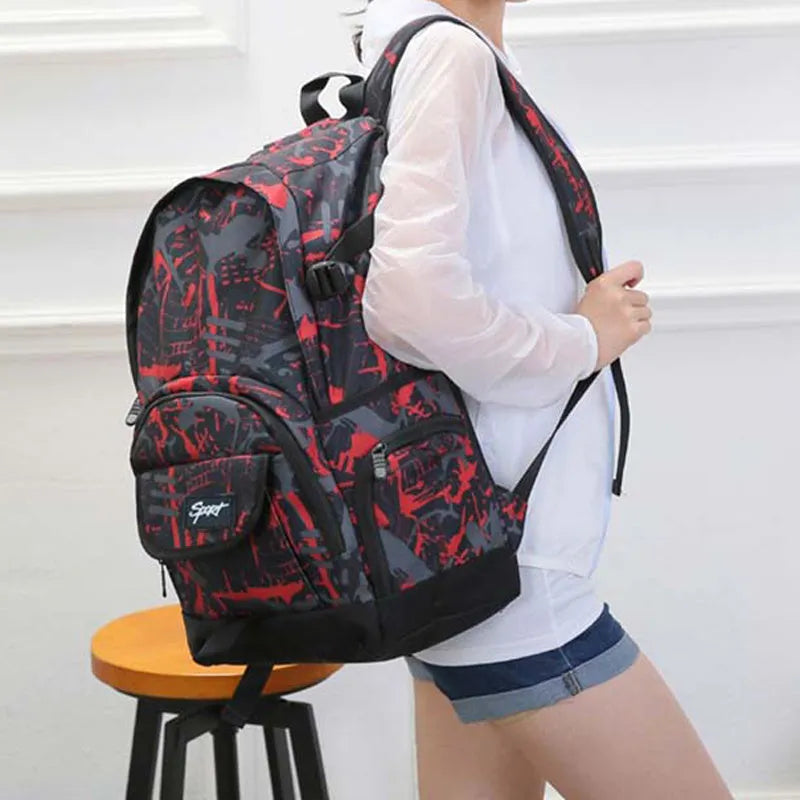 Classic blue nylon backpack with large main compartment shown on a plain background.