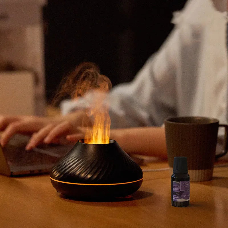 Beige aromatherapy diffuser with LED flame effect lighting and mist output