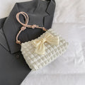 Women's canvas one-shoulder handbag in horizontal square shape with single strap and internal mobile phone pocket