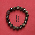 Hand-woven golden obsidian bracelet with 10mm round beads in a vintage style.