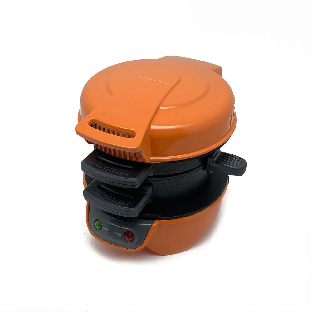 Bright red household breakfast machine with sandwich plates and egg cooker ring on countertop
