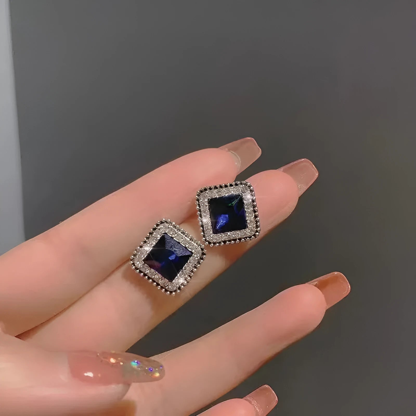 Close up of Korean blue diamond square earrings with geometric zinc alloy design for women