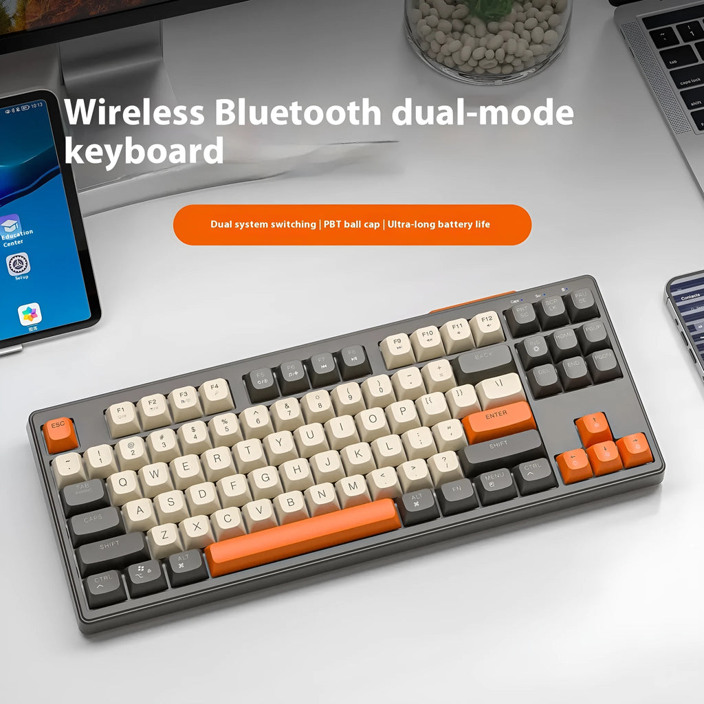 Free Wolf M87 wireless Bluetooth dual-mode mechanical feeling keyboard in blueberry colour on a desk