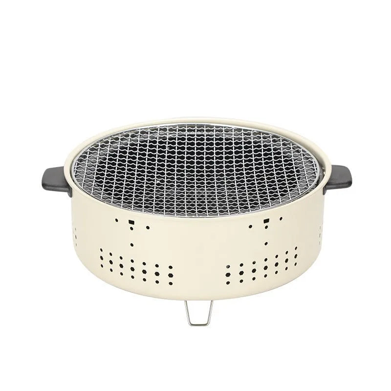 Portable indoor charcoal cooking stove with grill rack, modern simple design.