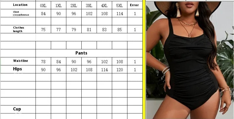 Black plus size one-piece swimsuit for women, sleeveless design, shown on a model.