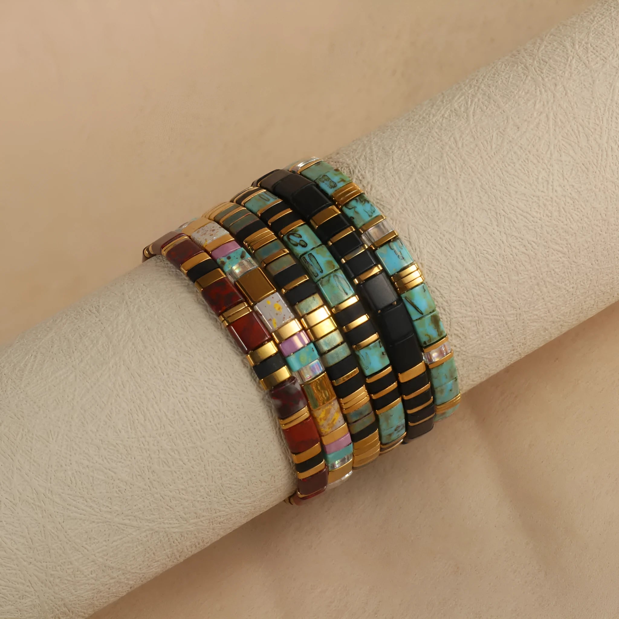 Geometric glass beaded bracelet in five colour options with pull beads adjustment
