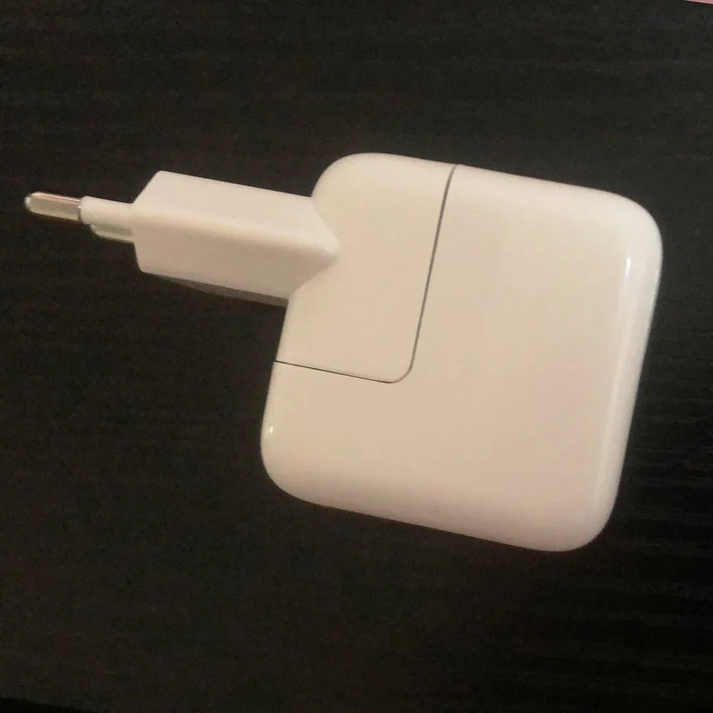USB charger for iPad tablets showing colour variants for 10W US, 10W EU, 12W US, and 12W EU specifications