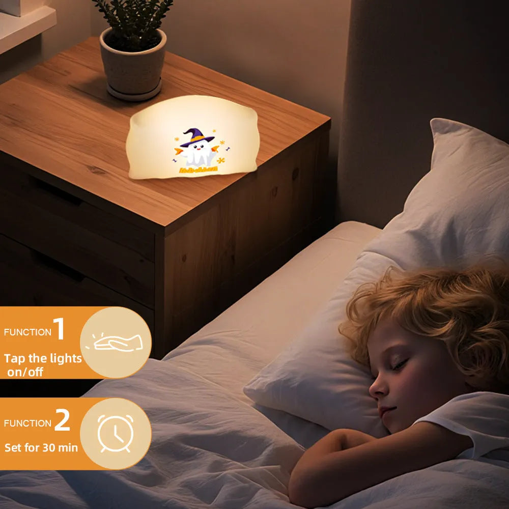 Cartoon Halloween doll table lamp in Magic Ghost design, showing warm light glow and USB-C charging port.