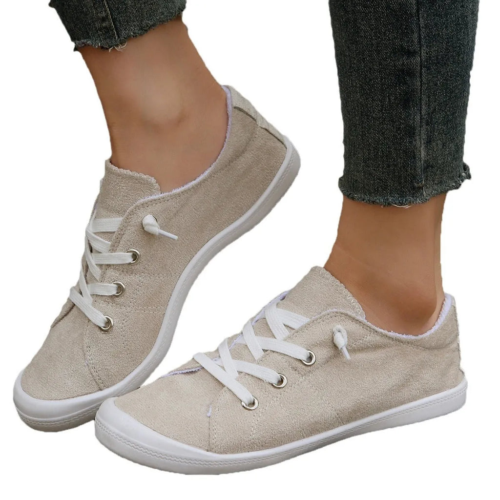 Women's creamy white low-top fabric casual sneakers with rubber sole