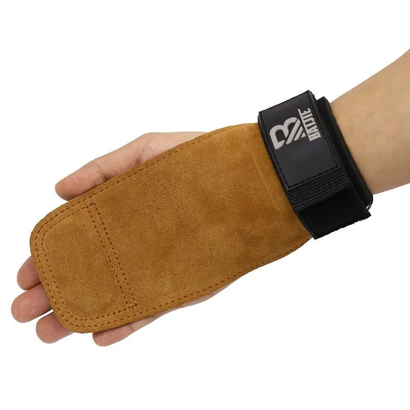 A pair of brown fitness hand protectors or wrist guards laid flat.