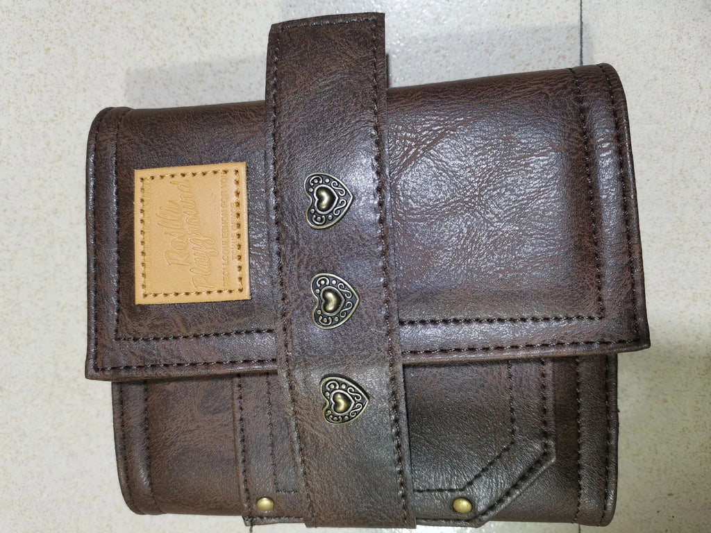 Brown retro buckle notebook with PU leather cover showing loose-leaf binder binding and A7 size format