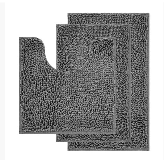 Dark green chenille U-shaped three-piece bathroom toilet carpet set on tiled floor.