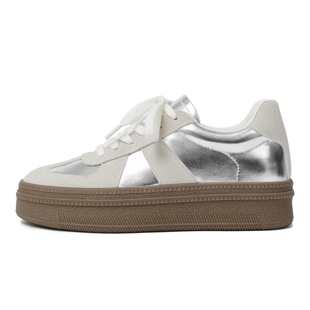 Retro sports board shoes with cross shoulder straps in milky white colour showing round toe and lace-up design
