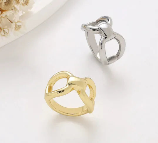 Titanium steel women's ring with hollow butterfly design and geometric details in gold or steel colour