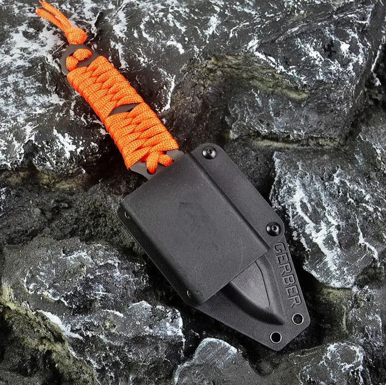 Camping survival knife with rope-wrapped handle and ABS sheath showing blade and full length