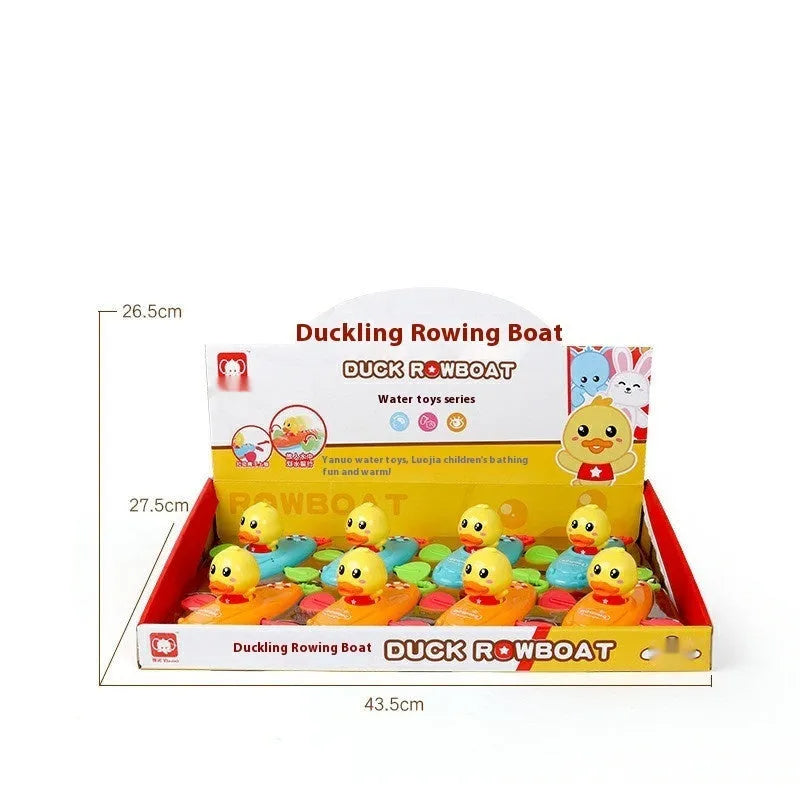 Yellow plastic wind-up swimming bath toys for children floating in water