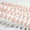 Set of frosted velvet Cat's Eye false nails in short ladder sizes XS, S, and M on a display stand.