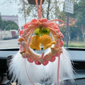 Handwoven wool bell orchid car pendant in green, shown hanging, with dream catcher variant.