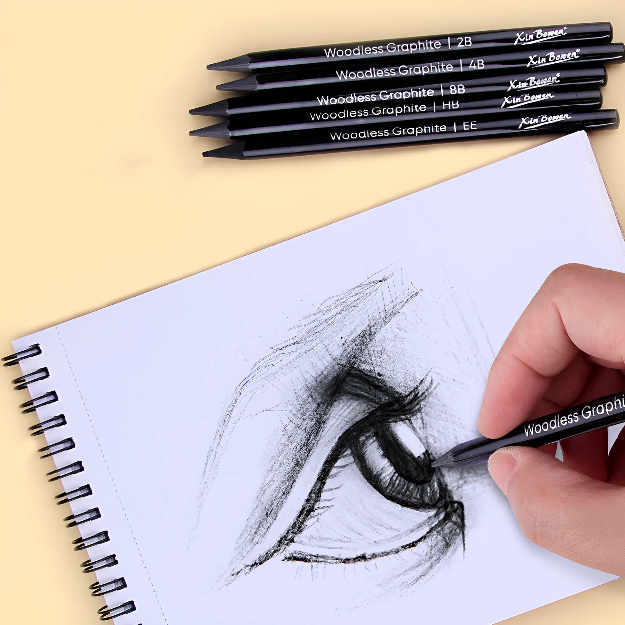 Set of six wood-free graphite sketching pencils with grades HB, 2B, 4B, 6B, 8B, and EE.
