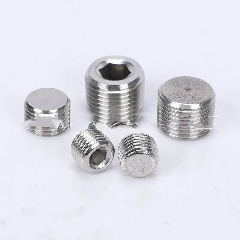 Stainless steel hexagon plug for 3/8 inch bulkhead pipe fittings on a white background.