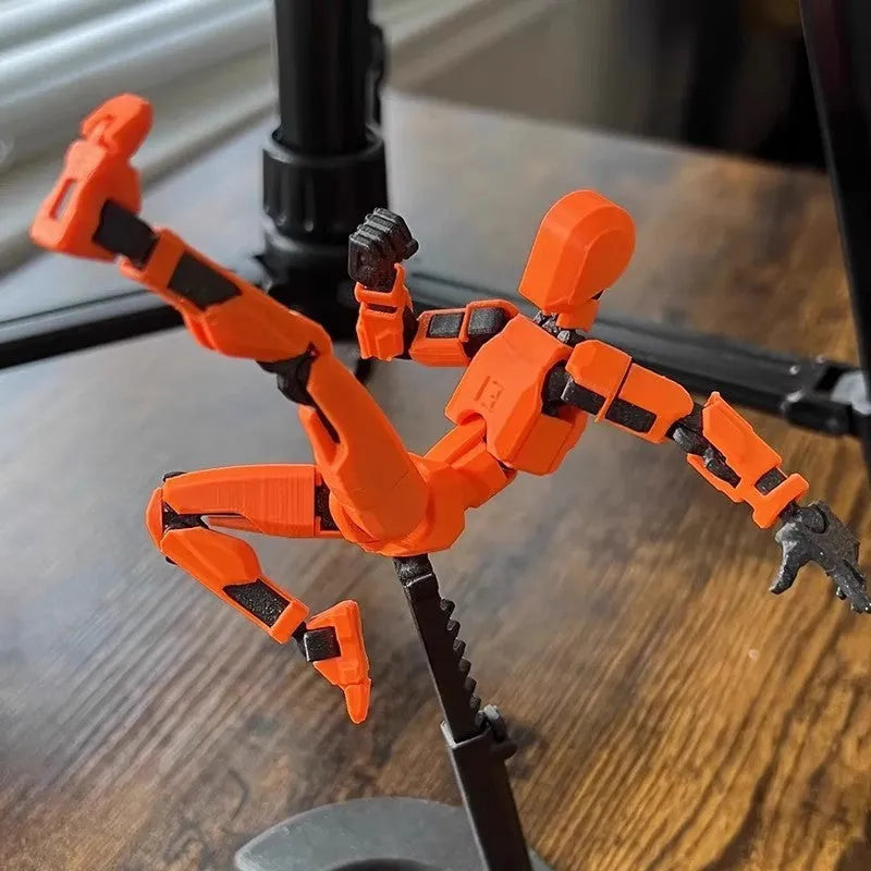 Unassembled 3D printed robot model kit with multi-jointed parts on a table