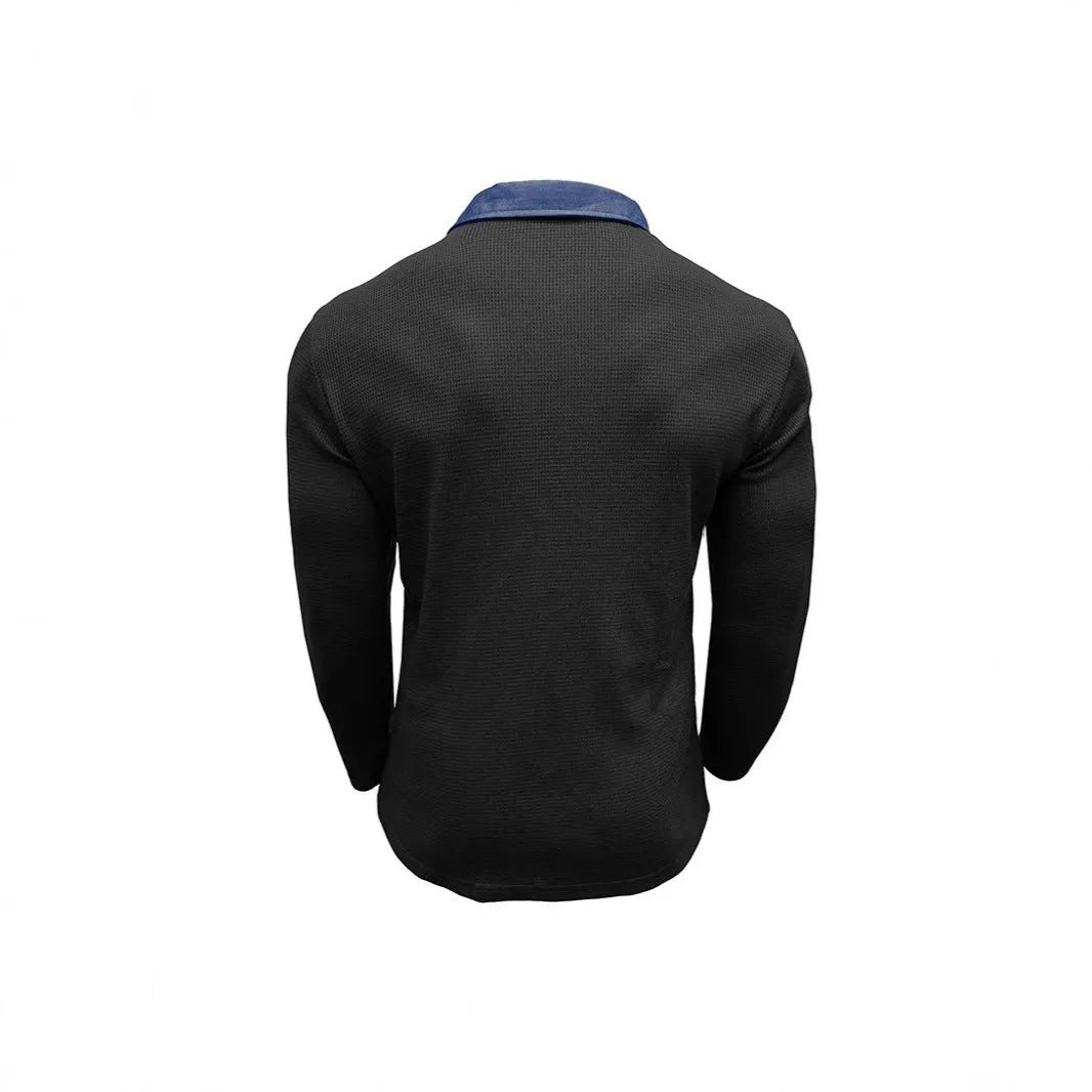 Men's long-sleeved waffle polo shirt in a solid colour with an asymmetrical retro style detail.