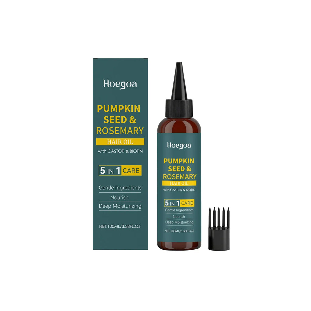 100 ml bottle of rosemary hair care essential oil with pointed applicator and hair comb on a white background.