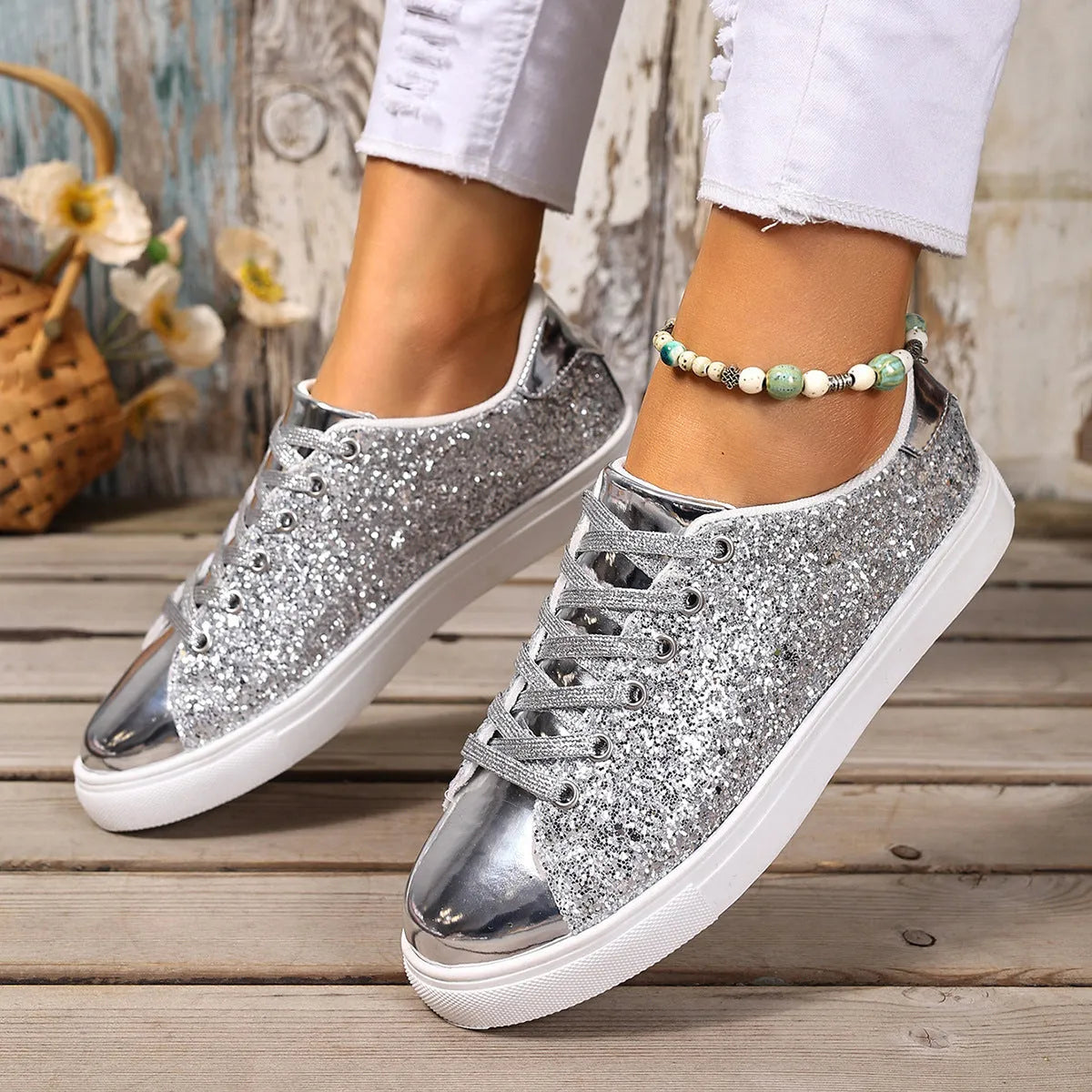 Women's plus size black lace-up board shoes with round toe and flat rubber sole.