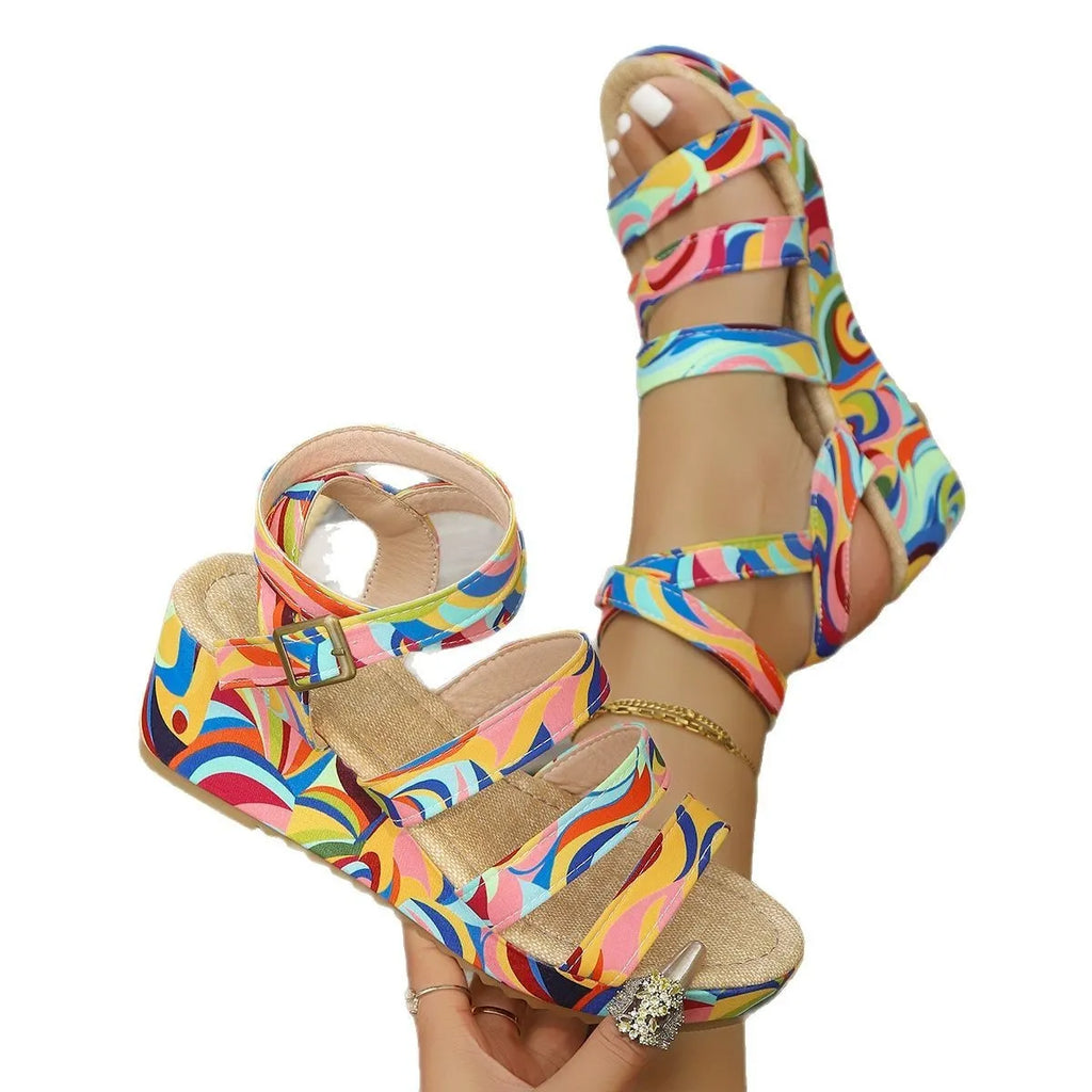 Women's lightweight buckle wedge sandals with fish mouth toe holder in a selected colour.