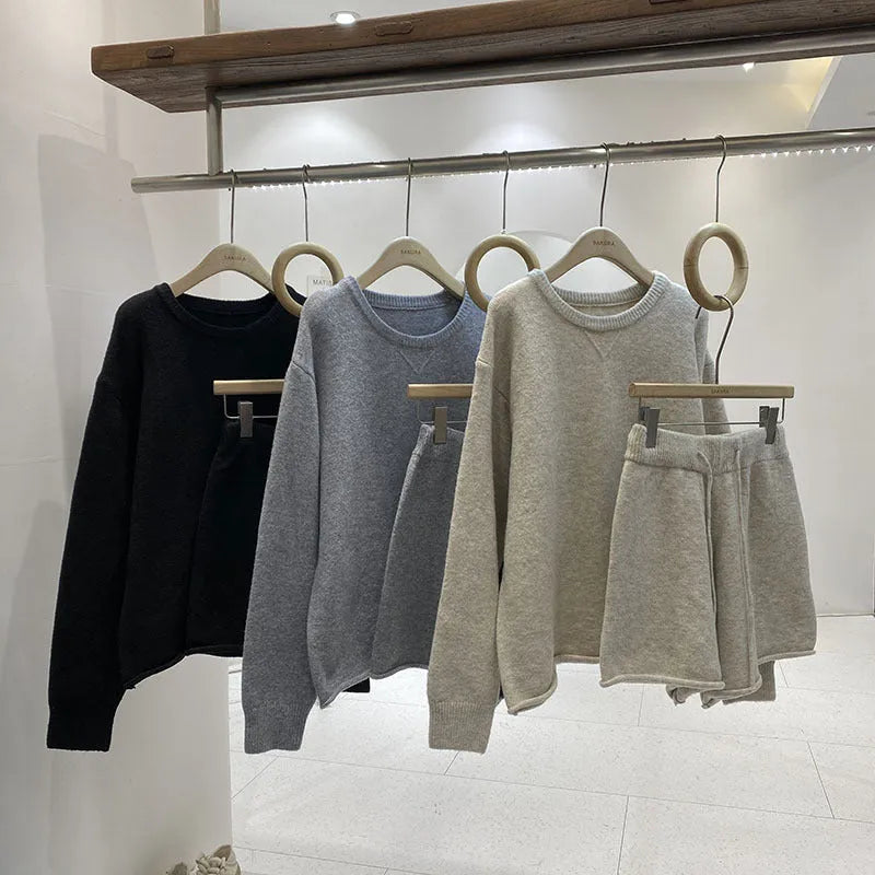 Women's loose-fit long sleeve sweater and knitted wide-leg shorts two-piece set in oatmeal colour.