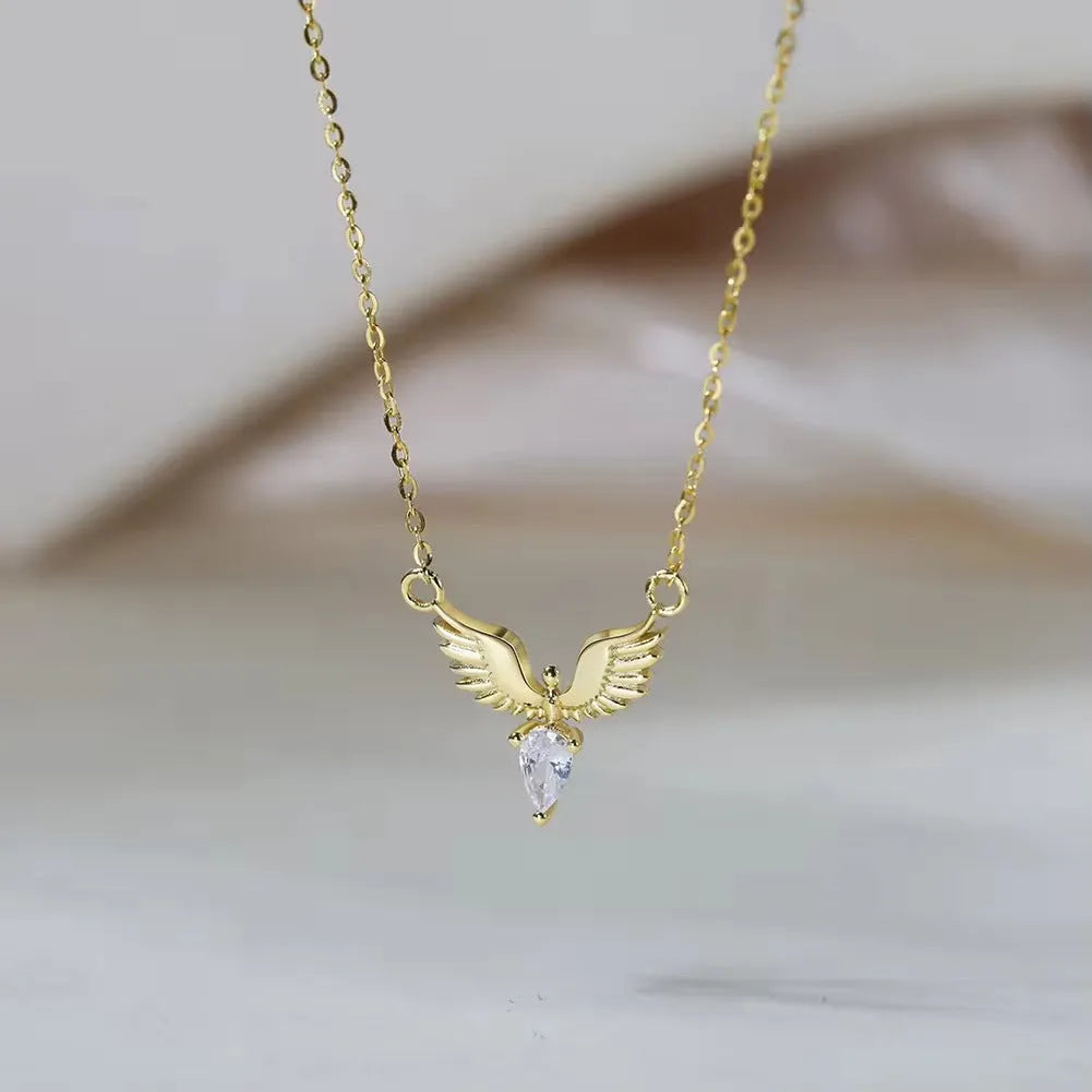 A silver necklace with an eagle pendant on an adjustable O-ring chain, available in white gold or yellow gold colour finish.