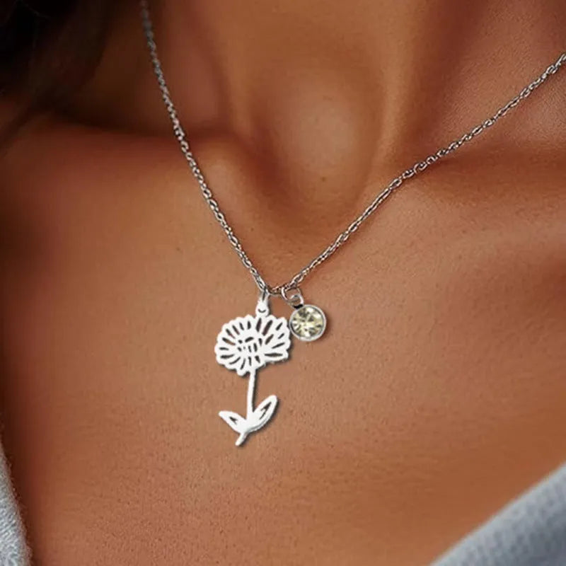 Stainless steel flower pendant necklace with rose-inspired design and adjustable O-link chain