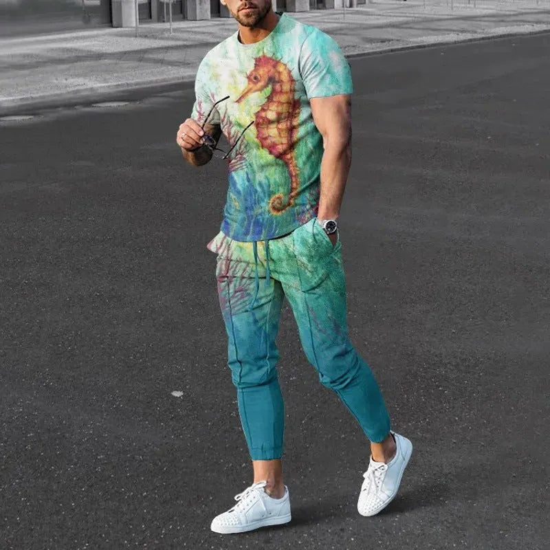Men's casual printed short sleeve pullover and matching trousers suit set on a white background.