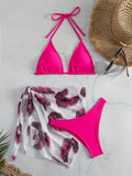 Women's orange three-piece bikini swimsuit set with a matching gauze skirt on a mannequin