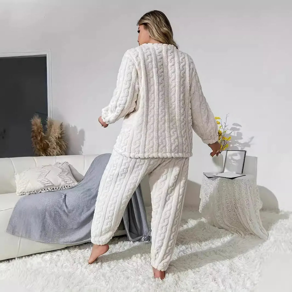 Women's milky white polyester two-piece pants suit with crew neck top and matching trousers