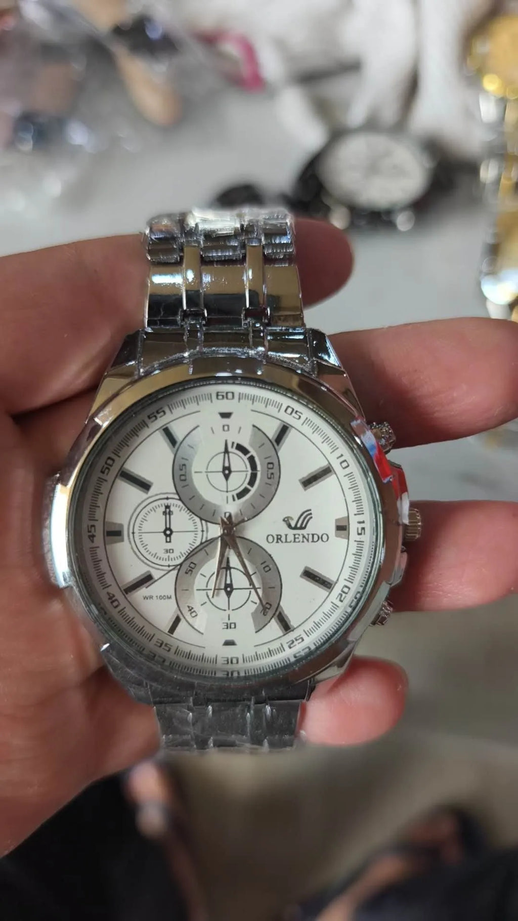 Men's multi-function business quartz watch with three-eye dial in silver gold colour, analogue display