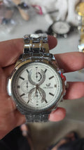 Men's multi-function business quartz watch with three-eye dial in silver gold colour, analogue display
